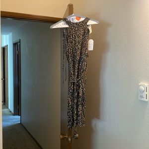 Adorable summer halter dress! With a fun pattern and light weight material